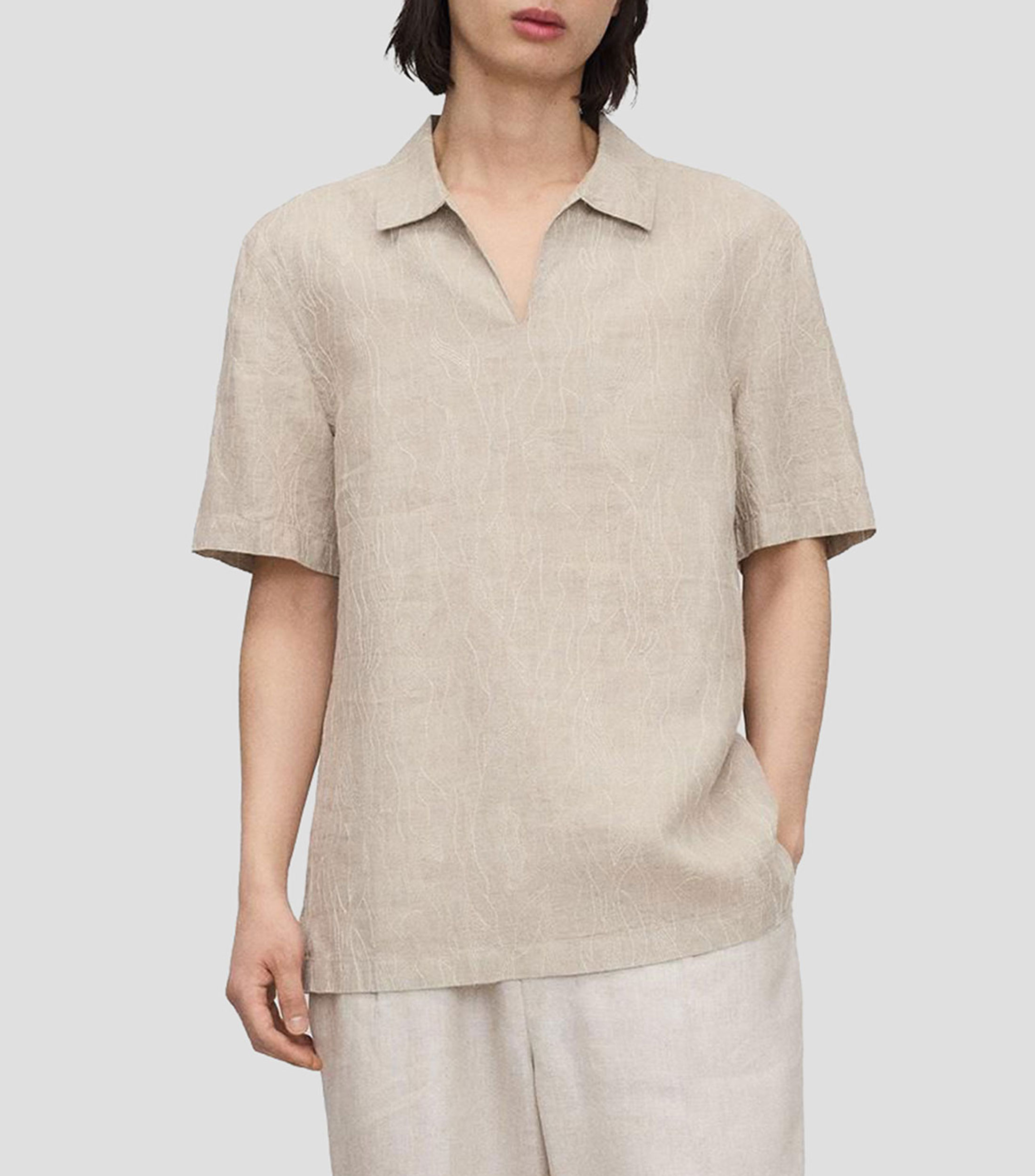 Playera tipo polo con manga corta jaspeada Hombre